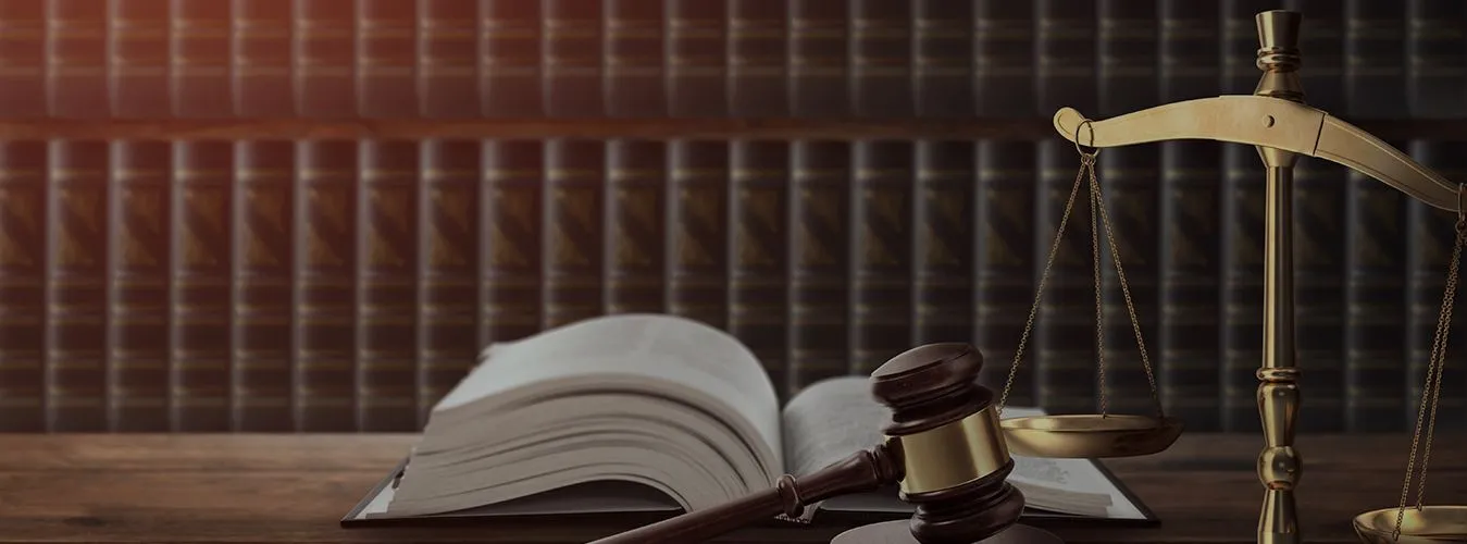 Open law book and gavel – Law Chambers of Mridul Jindal, legal advice in Indirapuram, Ghaziabad