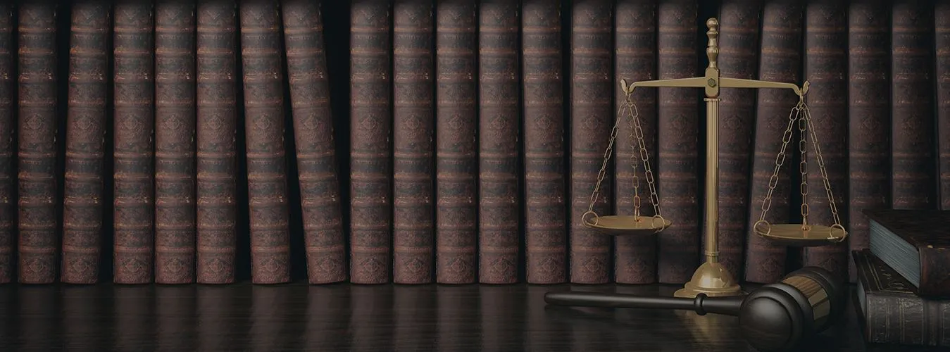 Law books and scales of justice – Law Chambers of Mridul Jindal, Delhi NCR